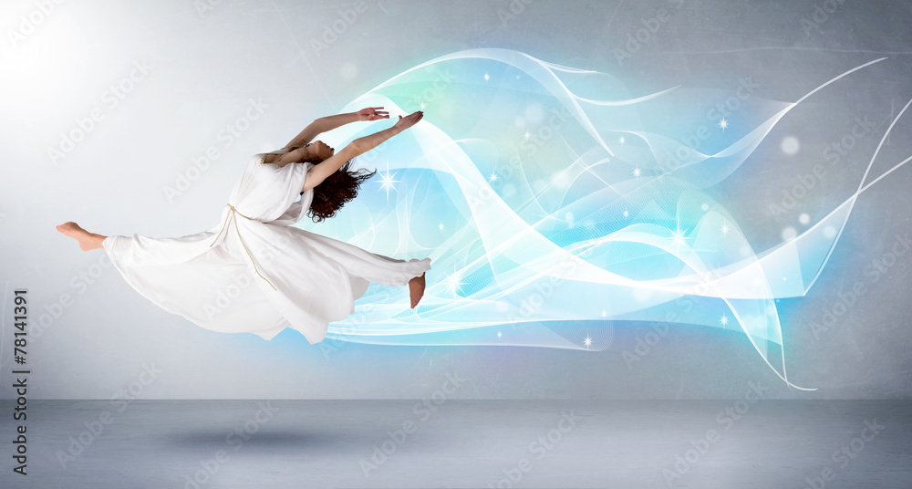 Naklejka premium Cute teenager jumping with abstract blue scarf around her