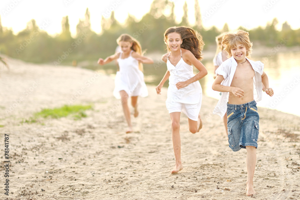 Portrait of children on the beach in summer Portrait of children on the beach in summer