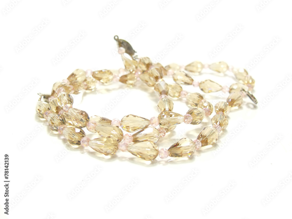 twisted strands of white pearls on a white background twisted strands of white pearls on a white background
