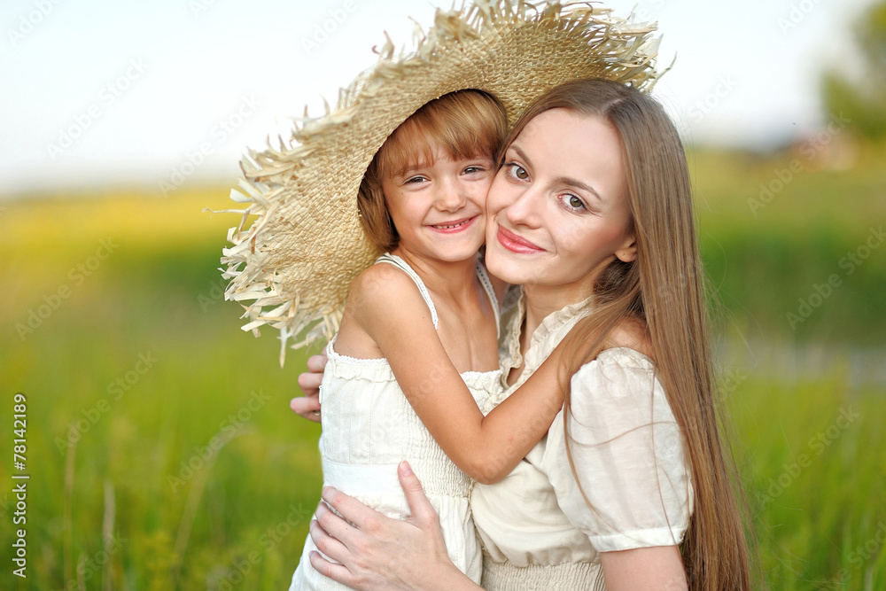 portrait of mother and daughter in nature