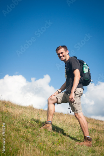 Young man hiking in the mountains © Aubord Dulac