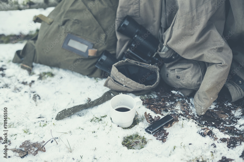 Explorer Belongings on the Ground with Snow
