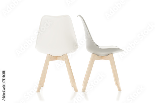 Empty Wooden Leg Chairs Isolated on White