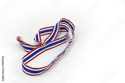 Thai flag pattern ribbon on white back ground photo