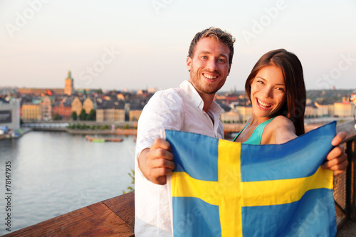 Swedish people showing Sweden flag in Stockholm photo