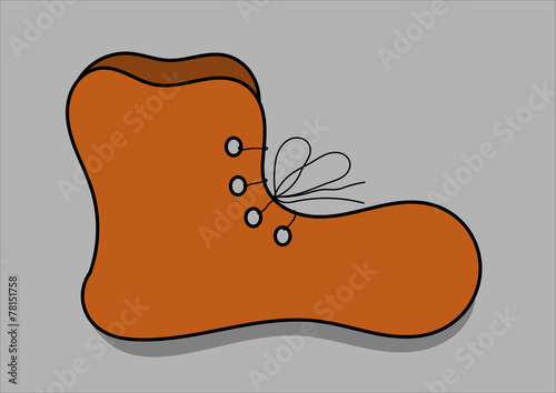 Old brown shoe on a gray background