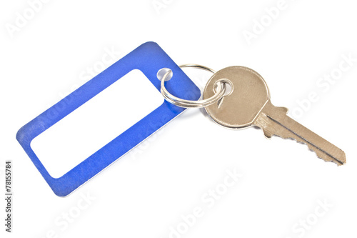 House key with blue tag isolated on white