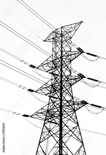 Silhouette high voltage electricity pylon on white background photo