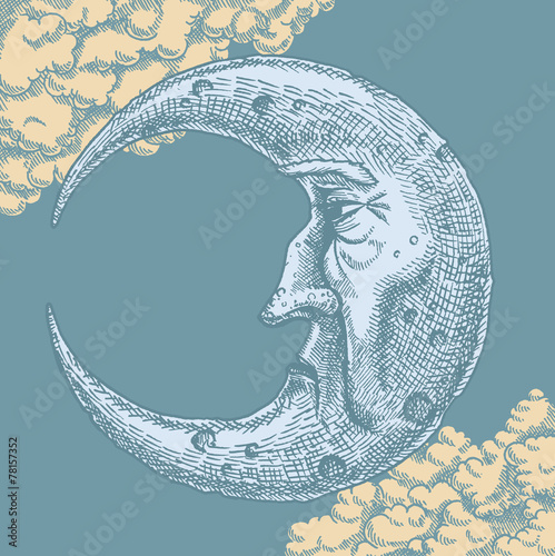 Crescent Moon Face Vintage Drawing. A vector freehand ink drawing of the man in the moon in vintage style. With clouds in the background of a moonlit sky. 