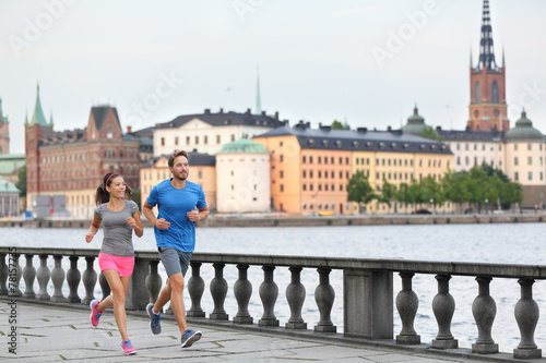 Fit exercise people running in Stockholm, Sweden photo