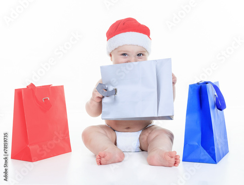 cute little boy with the holiday gift bag