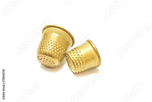 pair of golden thimbles