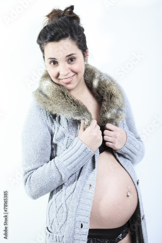 A Portrait of happy pregnant woman isolated over white backgroun