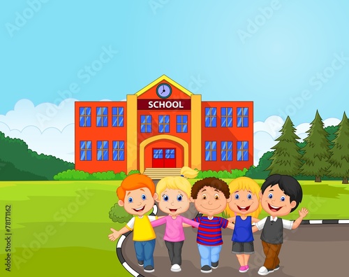 Happy school children in front of school