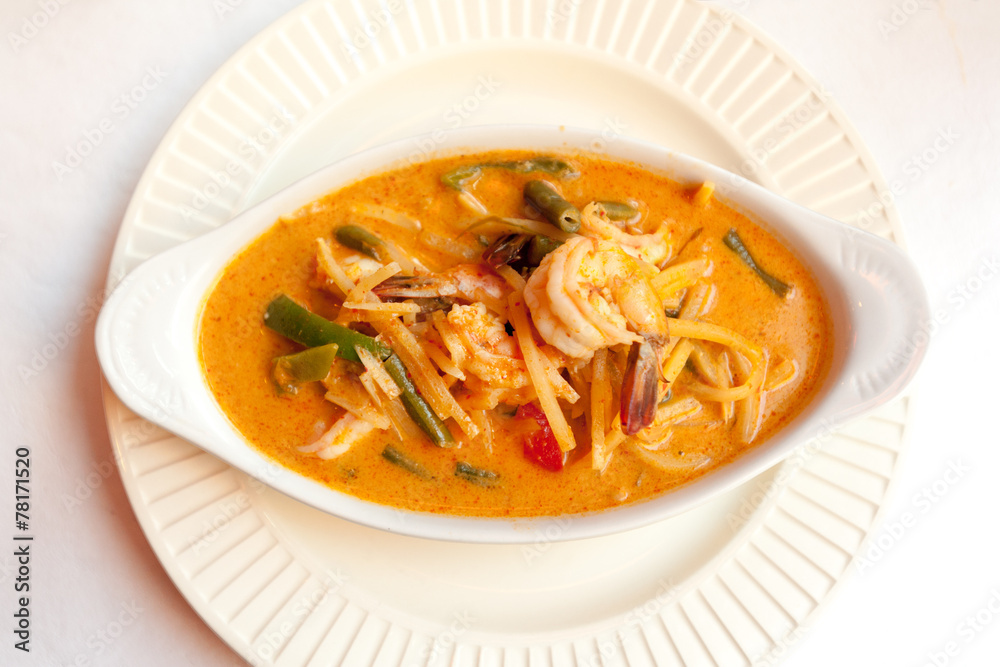 Red curry dish with chicken in Thai restaurant Red curry dish with chicken in Thai restaurant