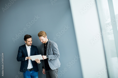 Young men with tablet