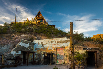 Acrylglasbilder Route 66 An old mine and house in Oatman, Arizona.  © jonbilous
