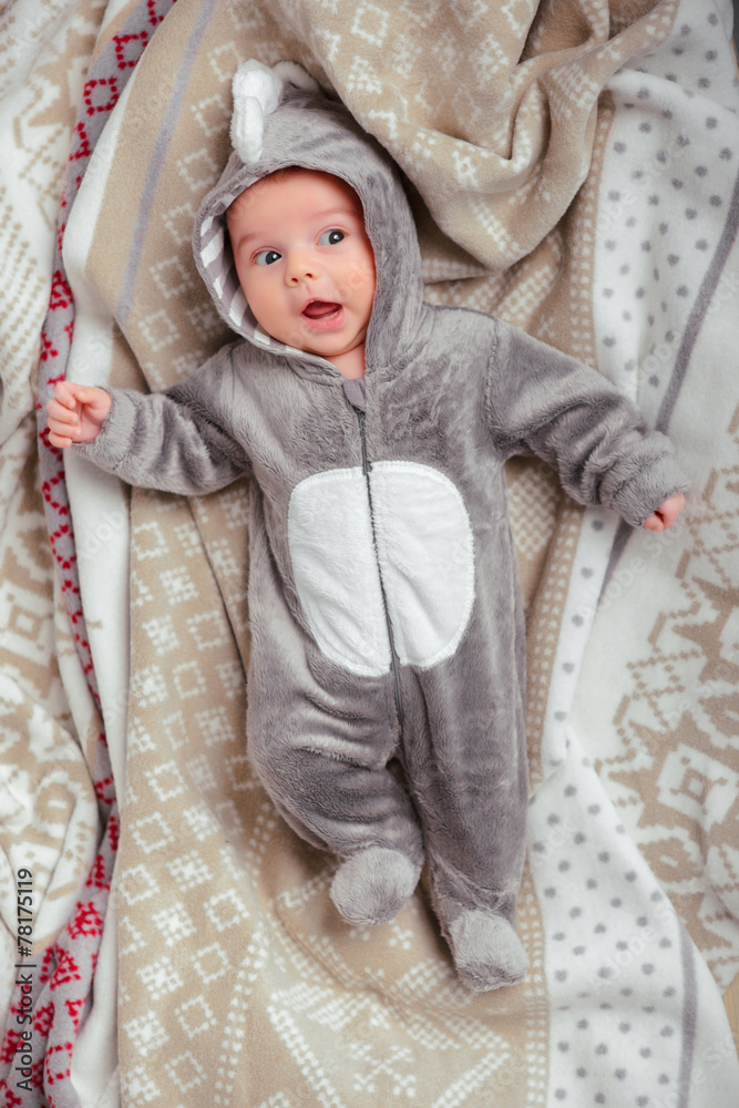 Adorable little baby in a funny bodysuit Adorable little baby in a funny bodysuit