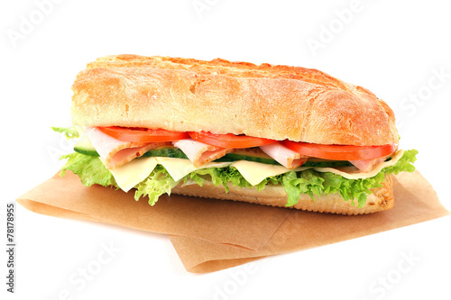 Photos Fresh sandwich on parchment isolated on white