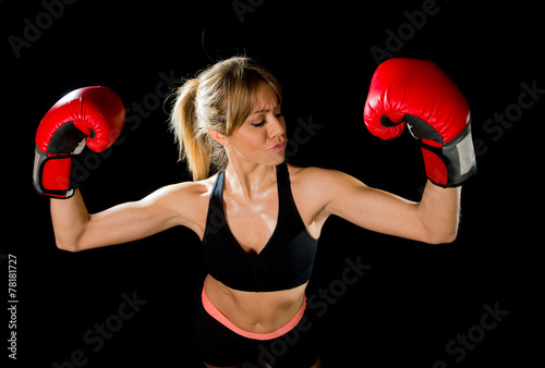 beautiful boxer woman posing sexy with boxing gloves