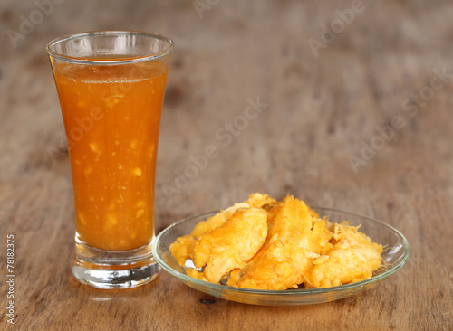 Medicinal Bael fruit with juice photo