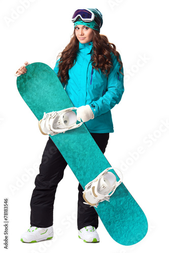 woman holding snowboard in studio