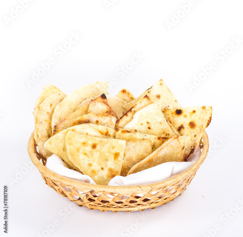 isolated basket plate of traditional eastern flat bread