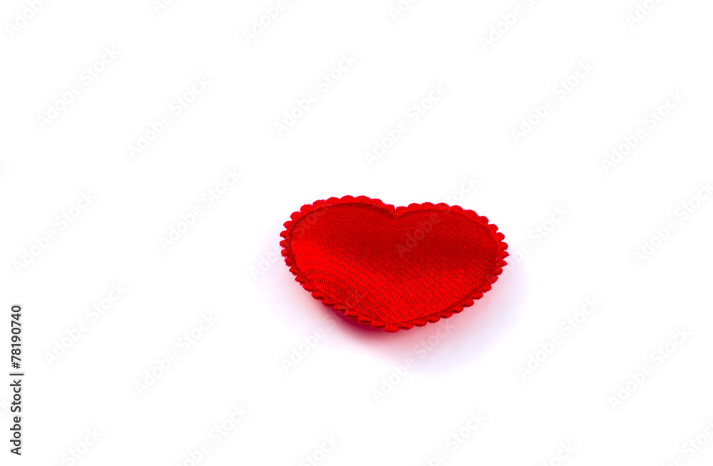 Little fabric red heart on a white background Little fabric red heart on a white background