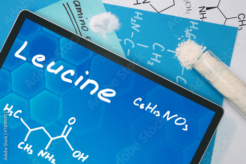 Tablet with the chemical formula of Leucine . Amino acids. photo