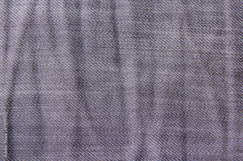 texture background - close up of wrinkled jeans material