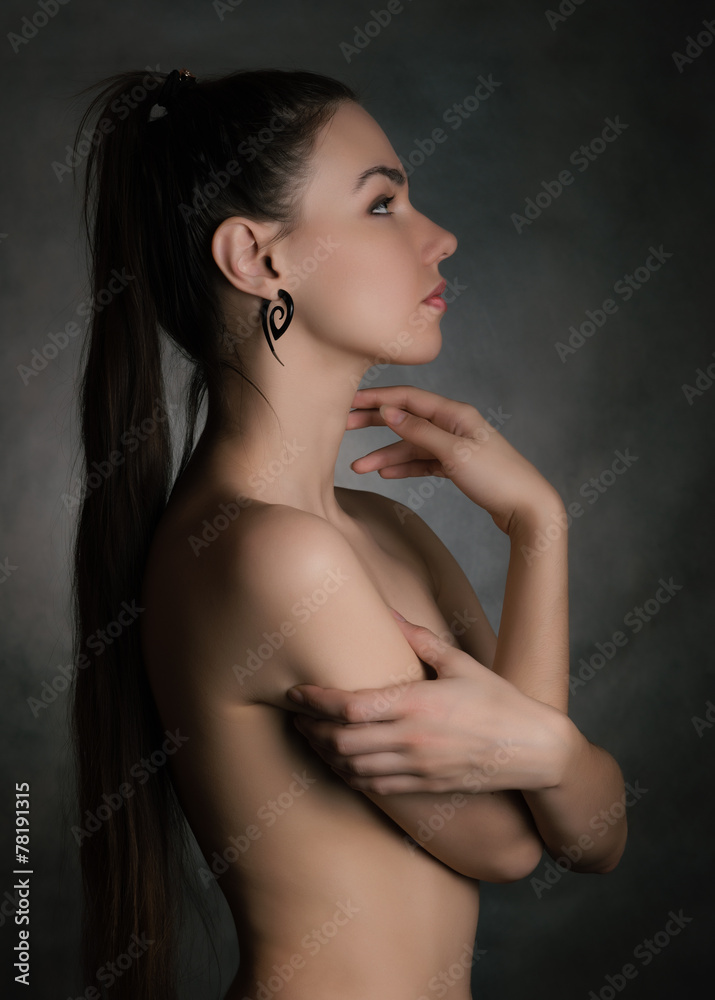 Portrait of beautiful sensual woman, close-up. Studio shot. Portrait of beautiful sensual woman, close-up. Studio shot.