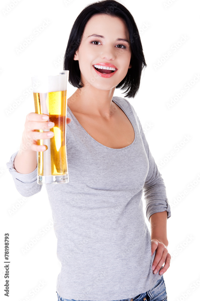 Young happy woman holding a glass of beer Young happy woman holding a glass of beer