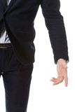 Businessman pointing down.