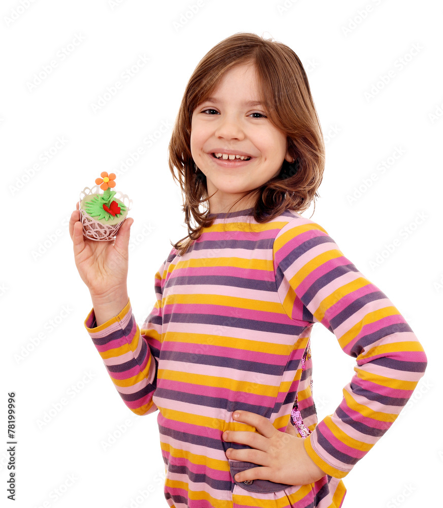 happy little girl holding spring flower muffin happy little girl holding spring flower muffin