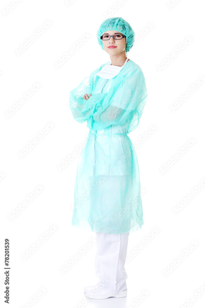 Full length female doctor with folded arms Full length female doctor with folded arms