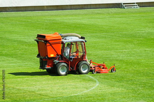 Mowing the grass on the football field