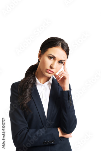 Businesswoman tired because of troubles