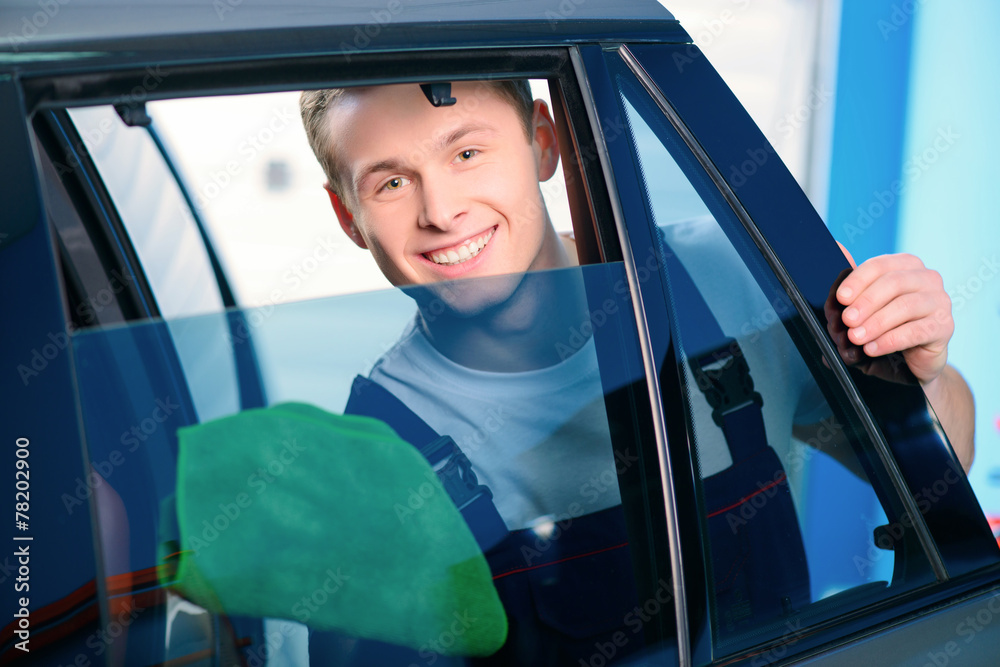 Naklejka premium Car mechanic at the service station