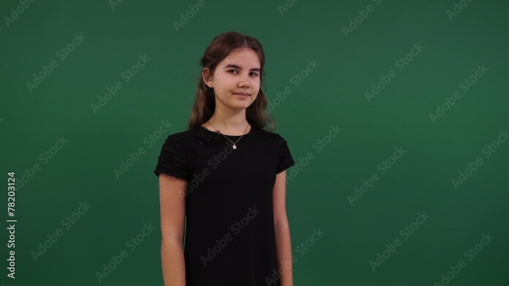 young beautiful girl on a green background young beautiful girl on a green background