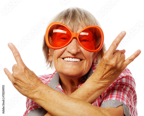 Senior woman wearing big sunglasses © Raisa Kanareva