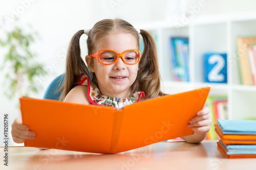 Happy funny child girl in g...