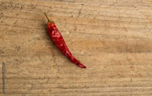 dried red pepper on wood