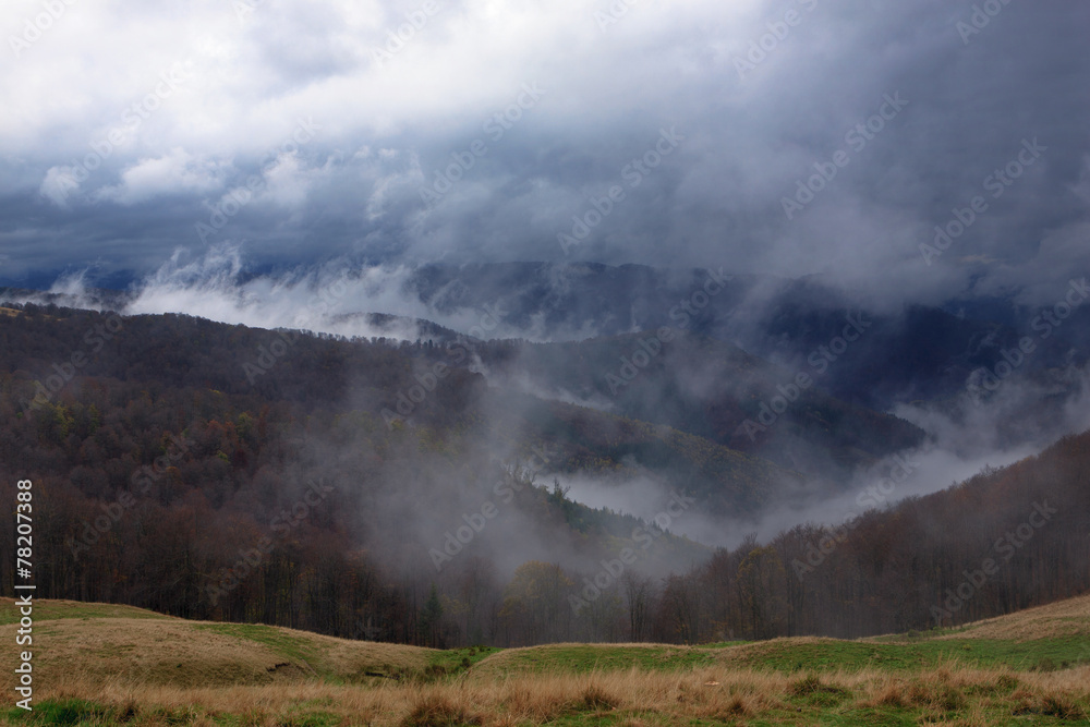 Clouds rise above the valleys in the Carpathians