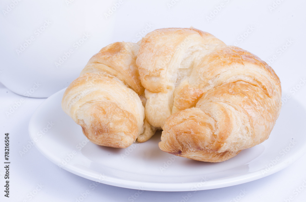 croissant on white dish