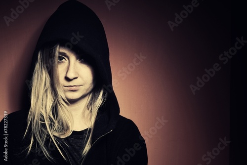 Obraz na płótnie Rebellious teenager in a hoodie. w salonie