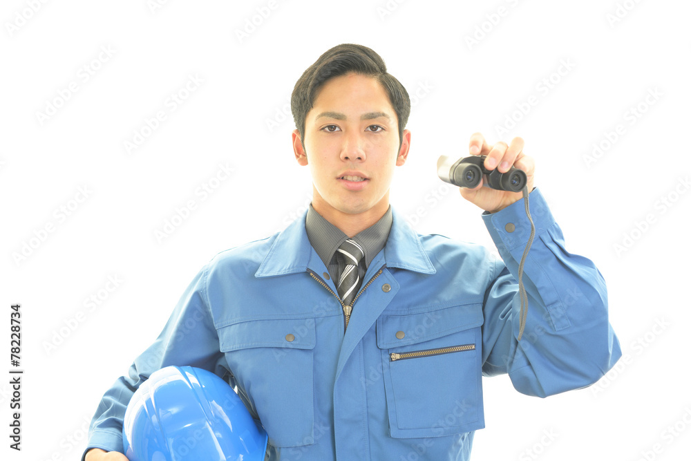 ガッツポーズの労働者