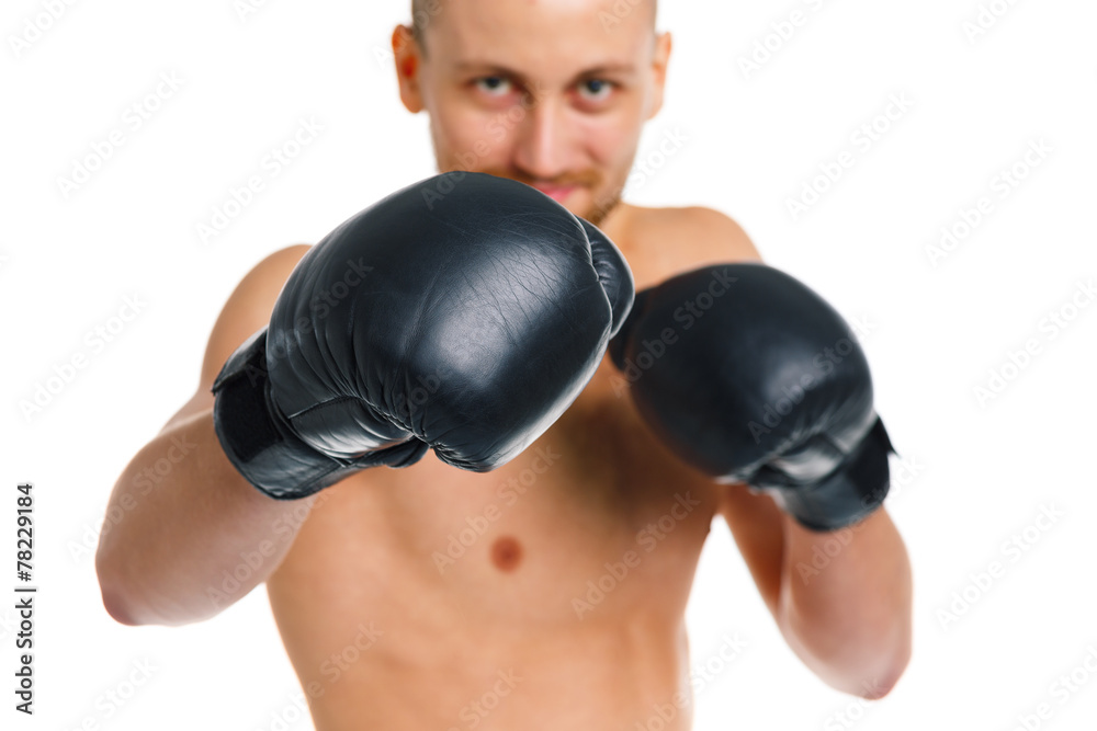 Sport attractive man wearing boxing gloves on the white Sport attractive man wearing boxing gloves on the white