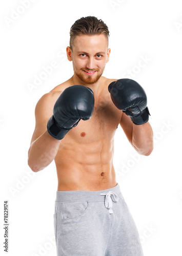 Sport attractive man wearing boxing gloves on the white