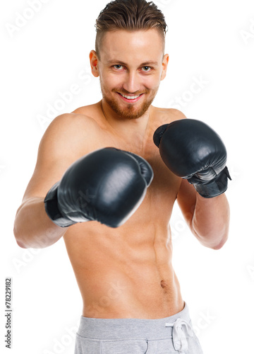 Sport attractive man wearing boxing gloves on the white