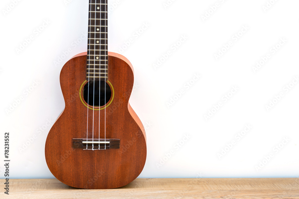 Fototapeta premium Ukulele on wooden table